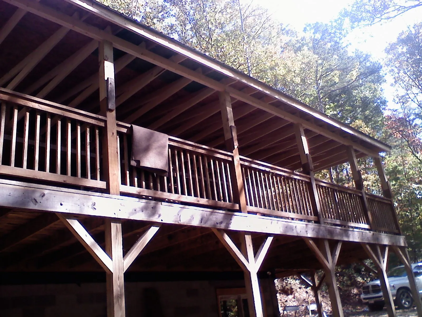 Timber framing under a new elevated porch and deck — Roof Leak Repair in Himrod by Roofing Brothers